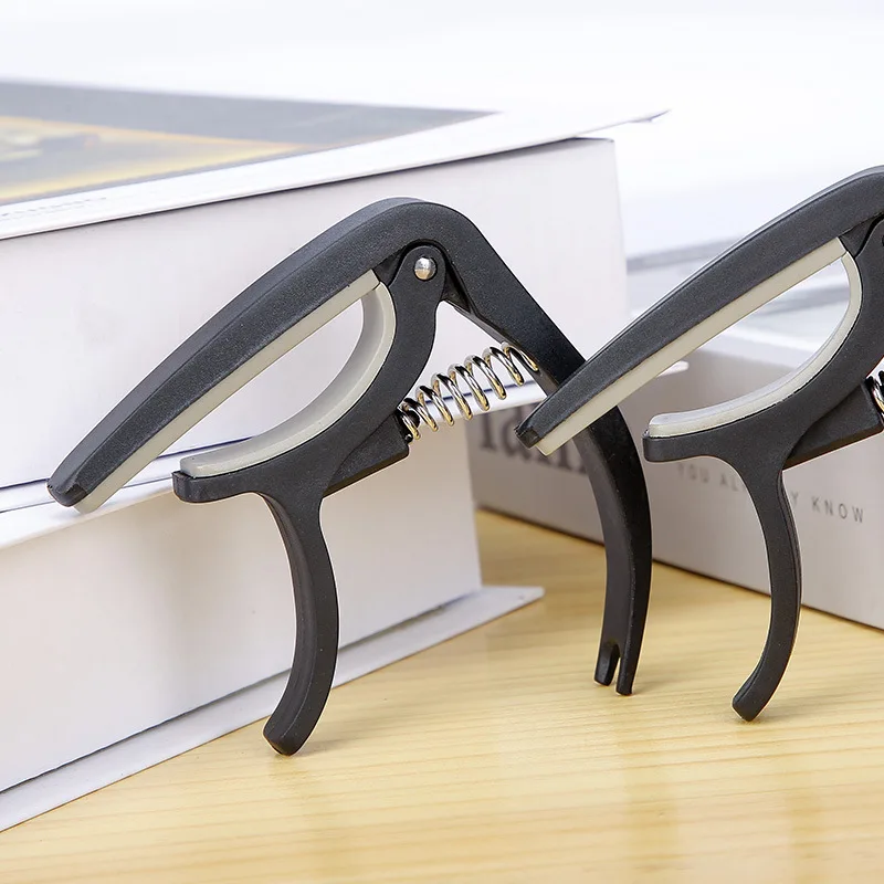 Braçadeira universal de afinaç - Guitar Capo Clip avaliação e preço